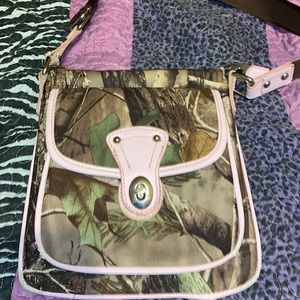 Four pocket cross body purse.